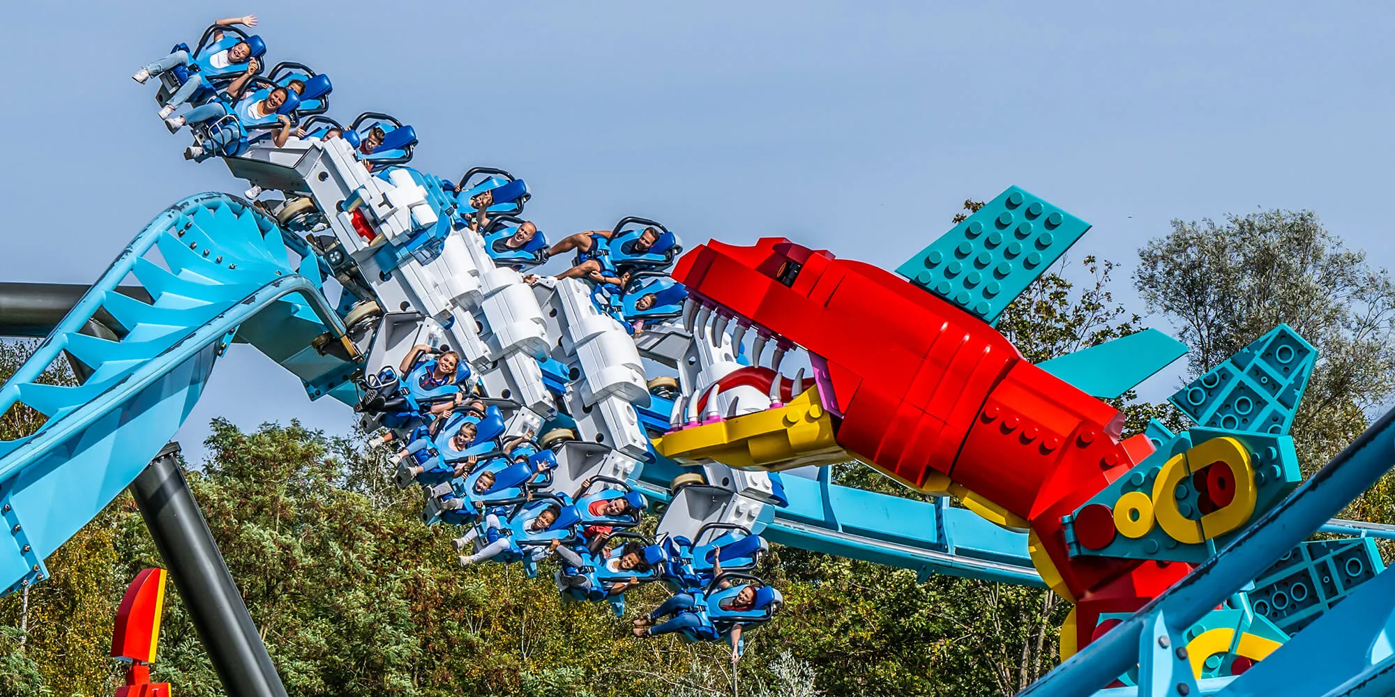 MAXIMUS roller coaster with guests at LEGOLAND Deutschland